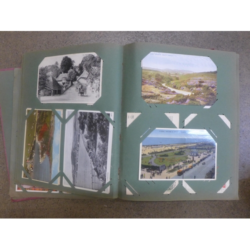 749 - An album of 330 Edwardian and later postcards, about half of which are saucy seaside humour