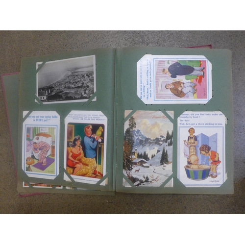 749 - An album of 330 Edwardian and later postcards, about half of which are saucy seaside humour