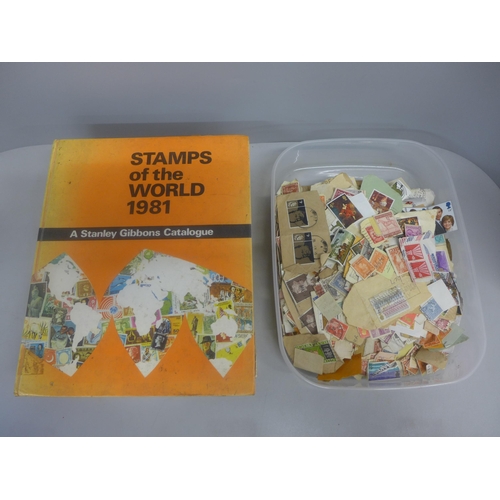 759 - A 1981 Stanley Gibbons Stamps of the World Catalogue and a box of loose stamps