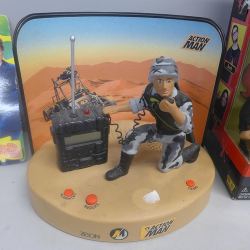 761 - An Action Man alarm clock, an Ozzy Talkin' Heads figure and an Austin Powers talking key chain