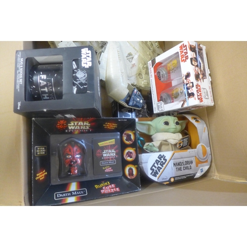 767 - A collection of Star Wars collectables; Millennium Falcon, a/f, Darth Maul Rubik's Cube, Mandalorian... 