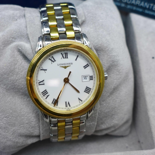 A Longines wristwatch with box and spare links 35mm case