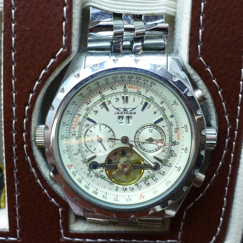 847 - Four wristwatches in an eight watch storage case