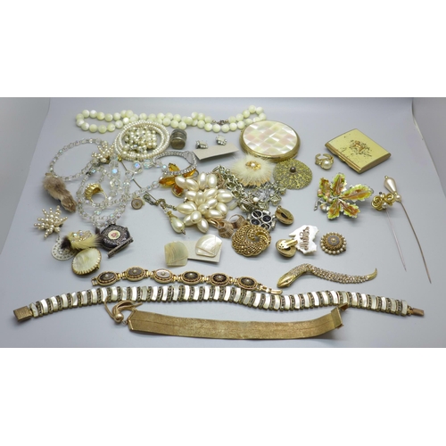 851 - Costume jewellery, hat pins, a Stratton compact, etc.