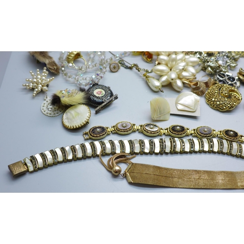 851 - Costume jewellery, hat pins, a Stratton compact, etc.