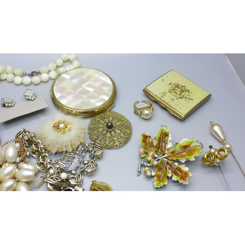 851 - Costume jewellery, hat pins, a Stratton compact, etc.
