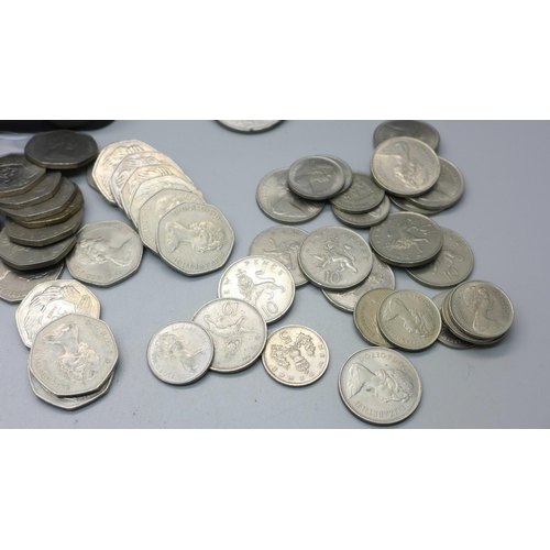 859 - Assorted collectable 50p coins including London Olympics and a collection of crowns including Church... 