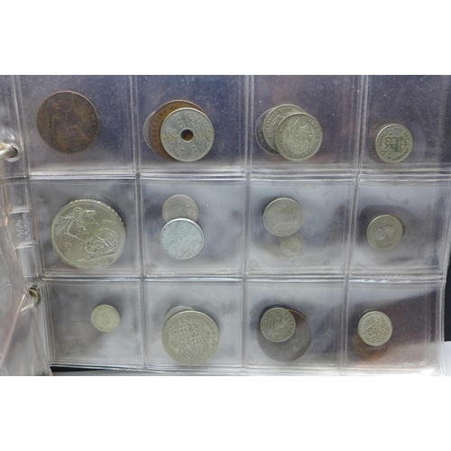 865 - An album of assorted coins including a Victorian shilling