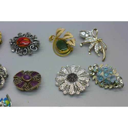 870 - A collection of brooches including Scottish