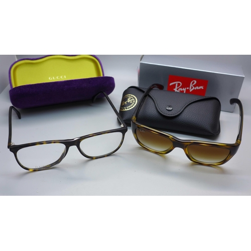 882 - A pair of Gucci and a pair of Ray-Ban glasses