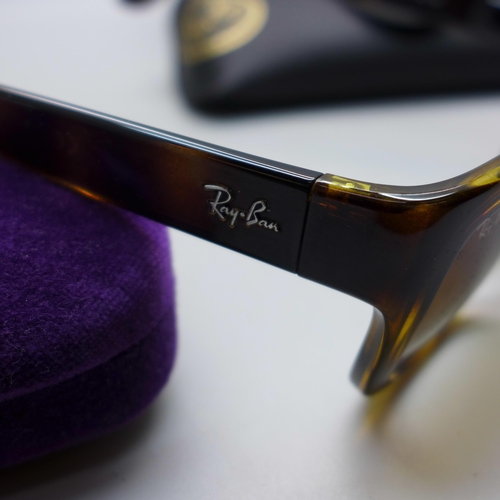 882 - A pair of Gucci and a pair of Ray-Ban glasses