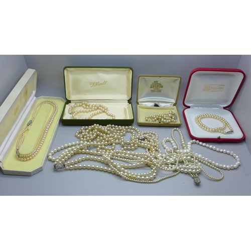 889 - A collection of pearls including silver mounted, Lotus and faux