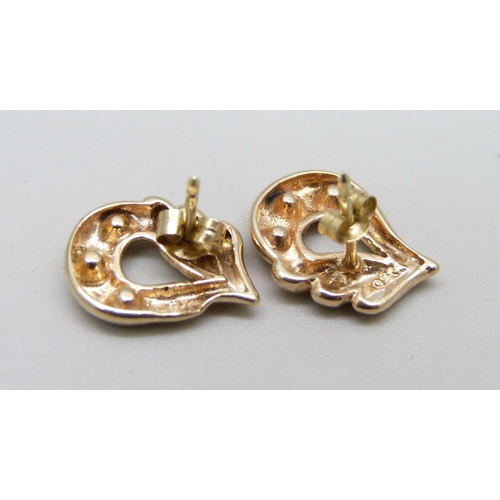 898 - A pair of 9ct gold and zircon earrings, 2.4g