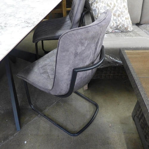 1440 - A Kos 130cm-180cm extending dining table with two grey velvet chairs and a bench * this lot is subje... 