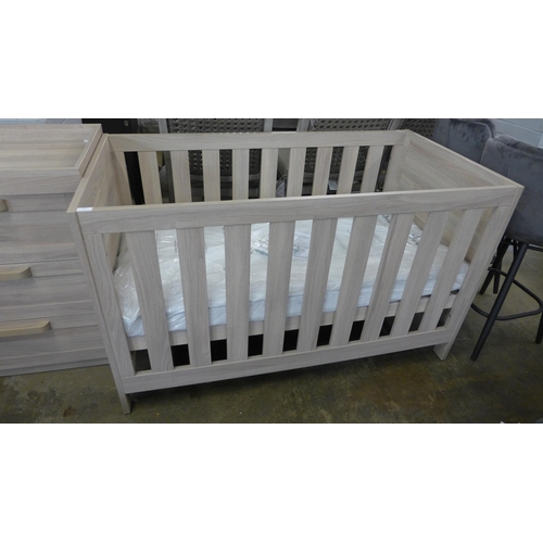 1456 - A Silver Cross wood effect cot bed and baby changing chest of three drawers * this lot is subject to... 