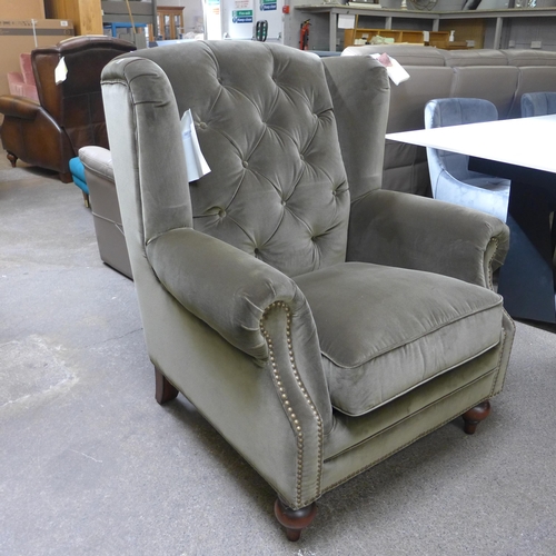 1468 - A Buckingham moss green velvet wingback armchair * this lot is subject to VAT - RRP £959