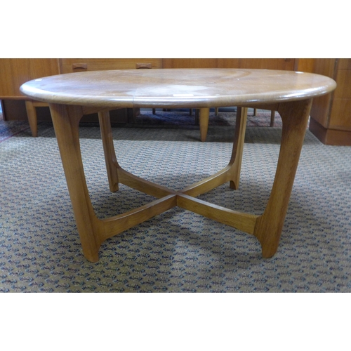 10 - An Ercol Blonde ash circular coffee table