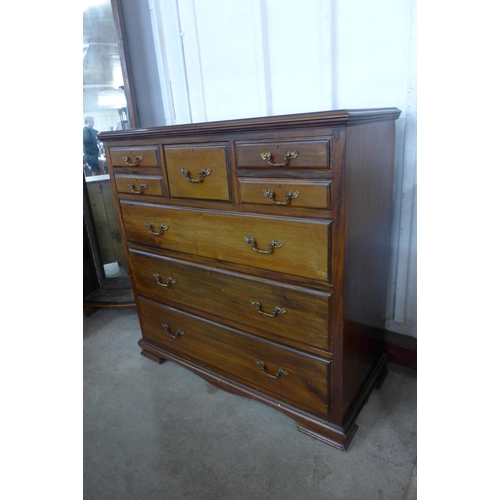 105 - A late Victorian walnut chest of drawers