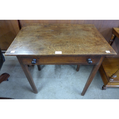 123 - A George III oak single drawer side table