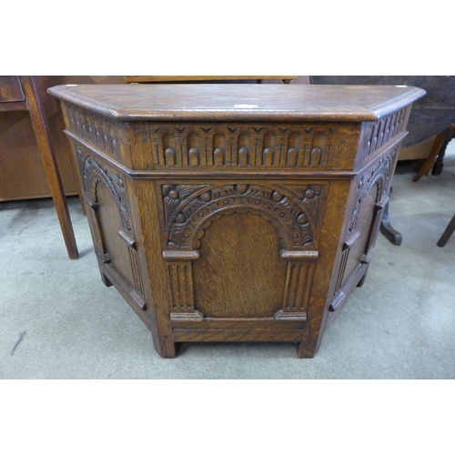 124 - A 17th Century style carved oak blanket box