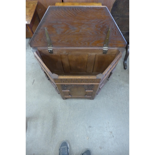 124 - A 17th Century style carved oak blanket box