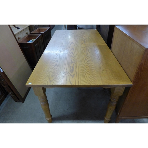 148A - A large ash dining table