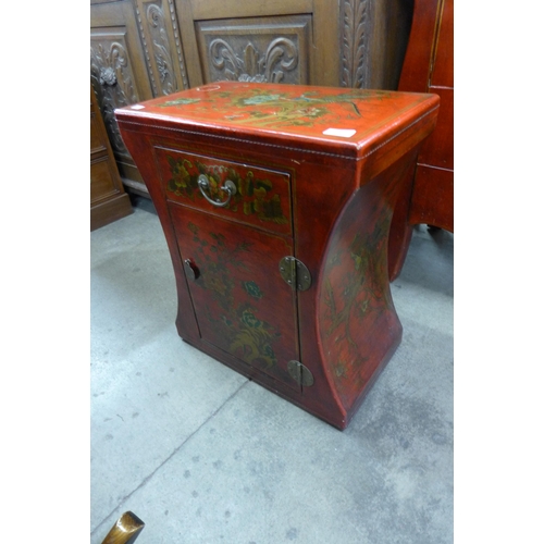 155 - A small scarlet Japanned cabinet