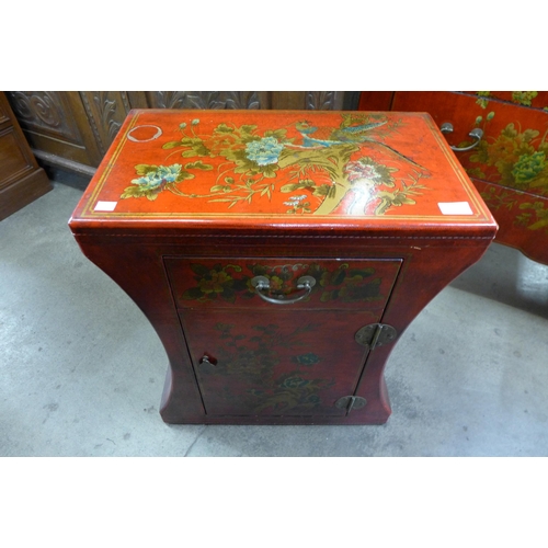 155 - A small scarlet Japanned cabinet