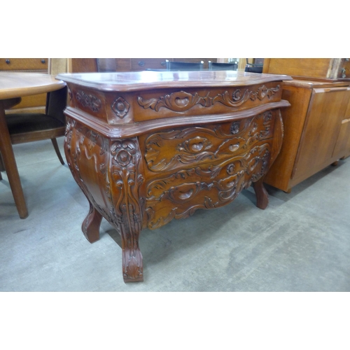 158 - A Dutch style hardwood bombe shaped commode