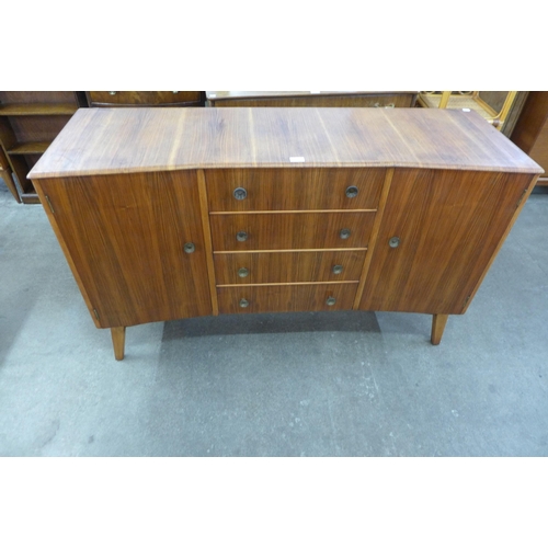 15B - An afromosia concave sideboard