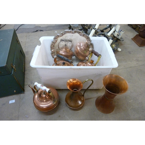 257 - Three copper kettles, a copper jug, a vase and a tray