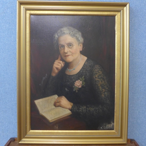 281 - English School, portrait of a lady reading, oil on canvas, framed