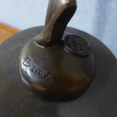 304 - An Art Deco style bronze figure of a female dancer, on rouge marble socle