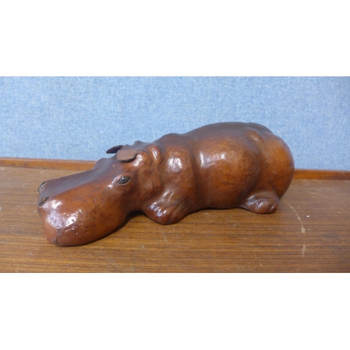 311 - A small brown leather hippopotamus