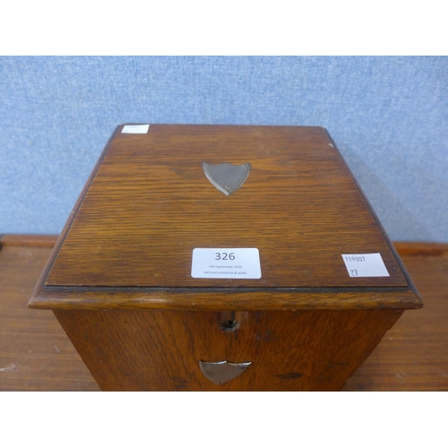 326 - An early 20th Century oak smokers cabinet