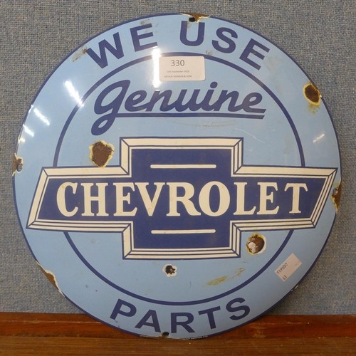 330 - An enamelled circular Chevrolet advertising sign