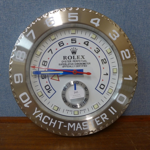 341 - A Rolex style dealer's display wall clock