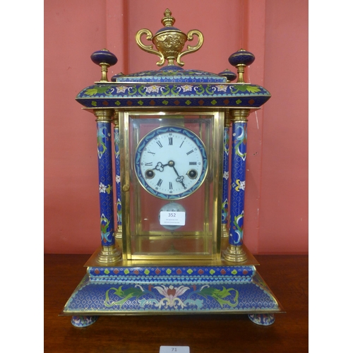 352 - A French style gilt metal and blue champleve enamelled desk clock