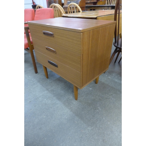 36 - A teak chest of drawers