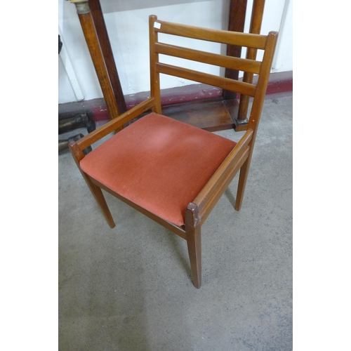 42 - A set of four dining teak chairs