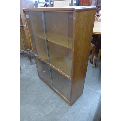 58 - A B&S Goodwin Ltd. of London walnut Roseberry bookcase