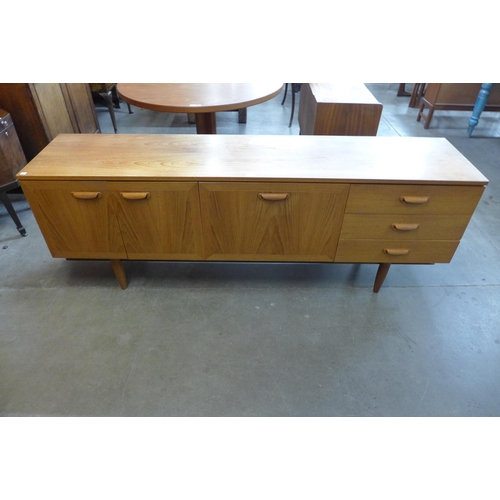 60 - A teak sideboard