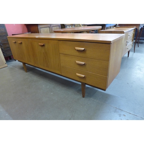 60 - A teak sideboard