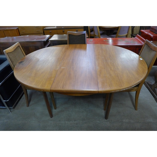 68C - A teak extending dining table and six G-Plan teak dining chairs