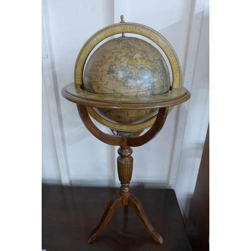 69 - A Regency style library terrestrial globe on stand