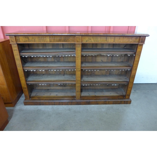 71 - A Victorian inlaid walnut open bookcase