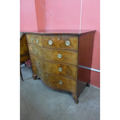 88 - A George III inlaid mahogany serpentine chest of drawers. With non-transferable Standard Ivory Decla... 