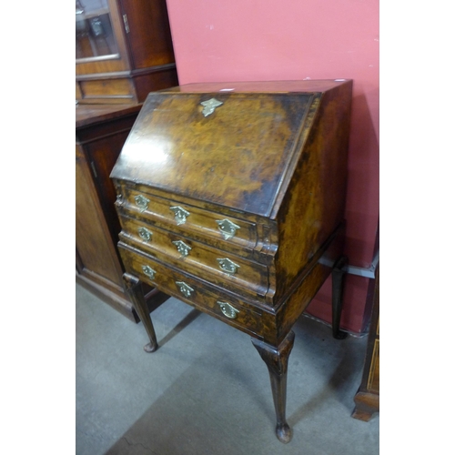 89 - A George I style figured walnut bureau de dame