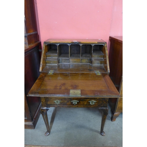 89 - A George I style figured walnut bureau de dame