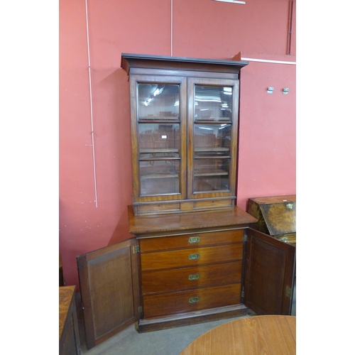 90 - A Victorian mahogany fitted four estate cupboard